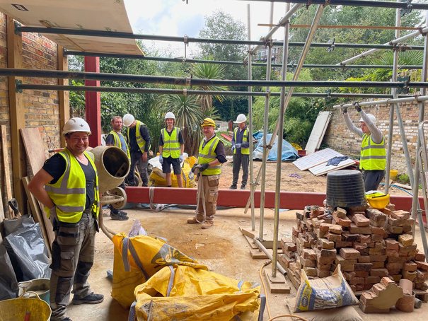 Henley Build site team in hi-vis on site in Richmond